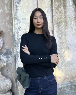 Jersey de punto negro botones dorados